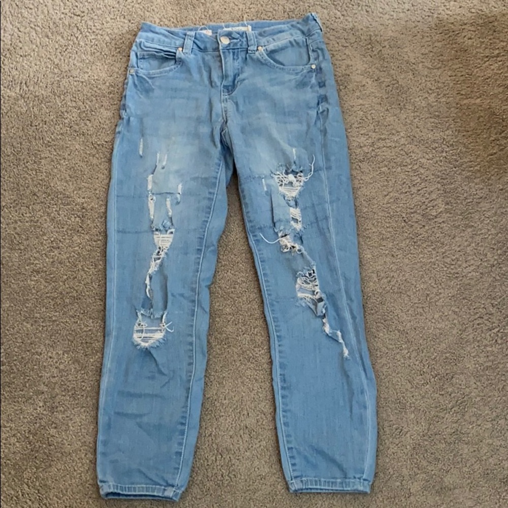 Light blue ripped jeans